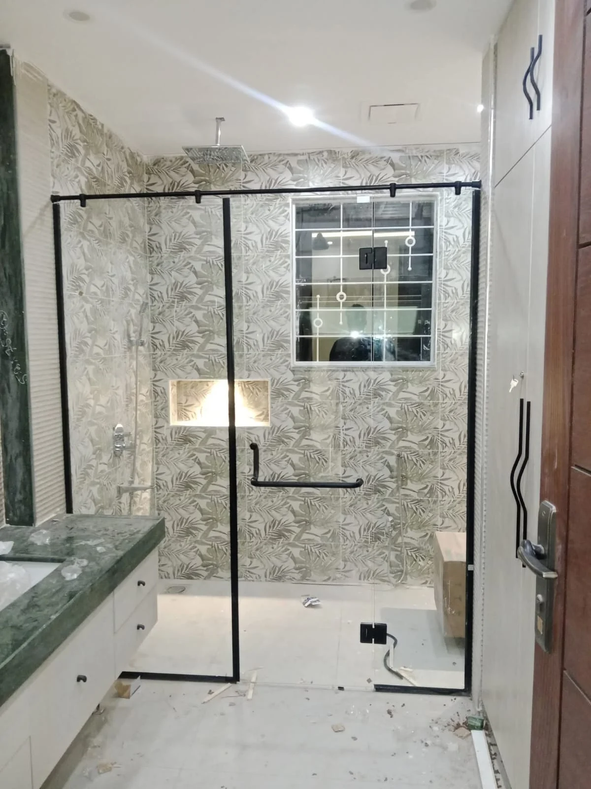 Black-frame shower enclosure